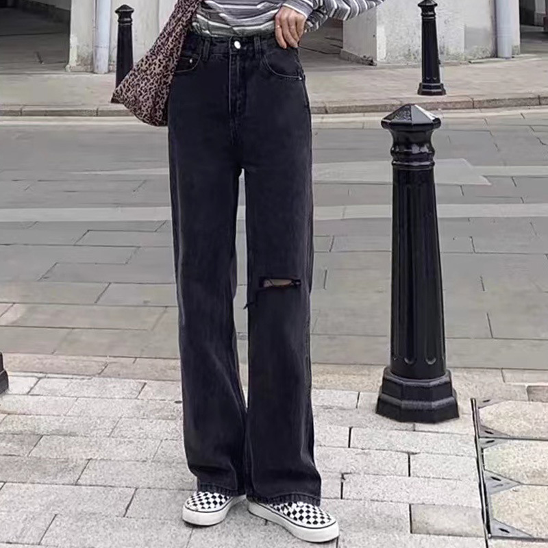 大きいサイズのレトロな国風の花の穴のデザイン感のジーパンの女性の秋の高い街はゆったりしていて痩せています。|undefined