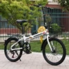 White bike shifter (brake handle), bike spokes