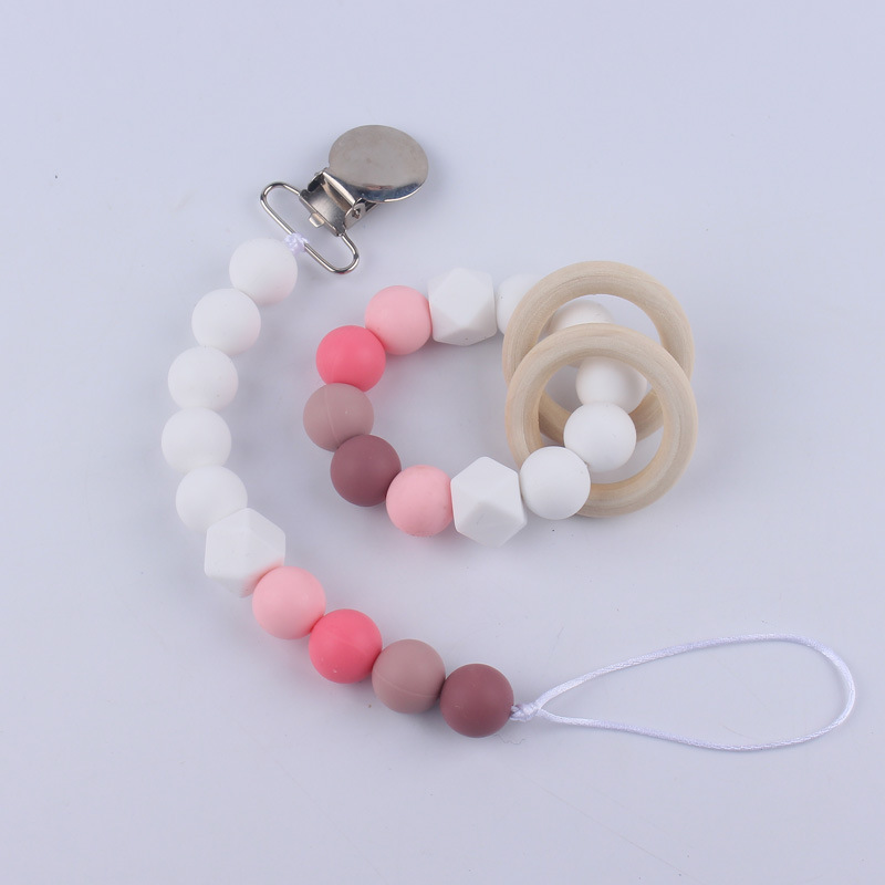 Nuevos suministros para bebés Cadena de chupete DIY creativo contraste color cuentas de silicona mordedor anti-caída traje de cadena