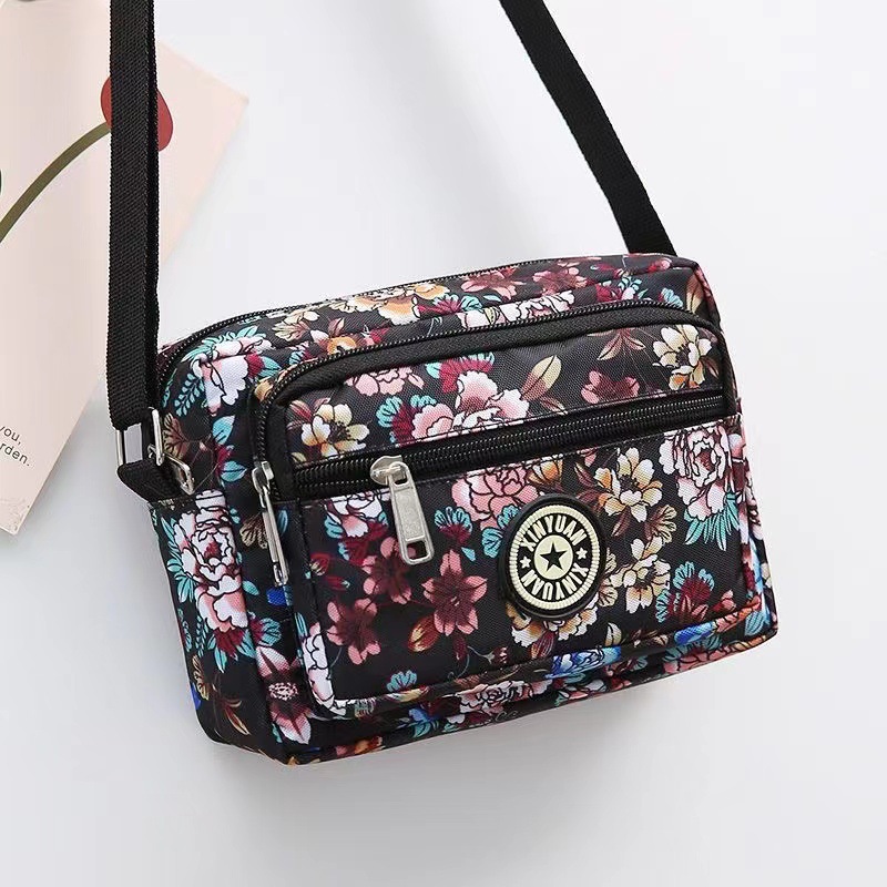 Bolsa de tela de flores bolsa de mensajero de las mujeres nueva bolsa de Madre de gran capacidad bolsa de hombro individual de mediana edad y ancianos bolsa de tela Oxford bolsa
