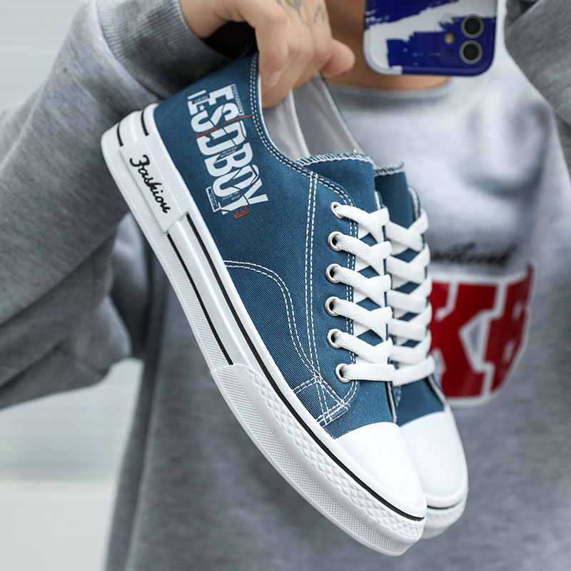 Zapatos de hombre 2024 tendencia nueva tendencia casual universal hombre bajo deportivo de suela gruesa zapatos de lona juvenil