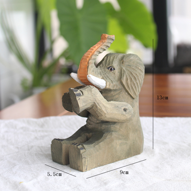 재고가 있는 앉은 자세 코끼리(재고 정리)