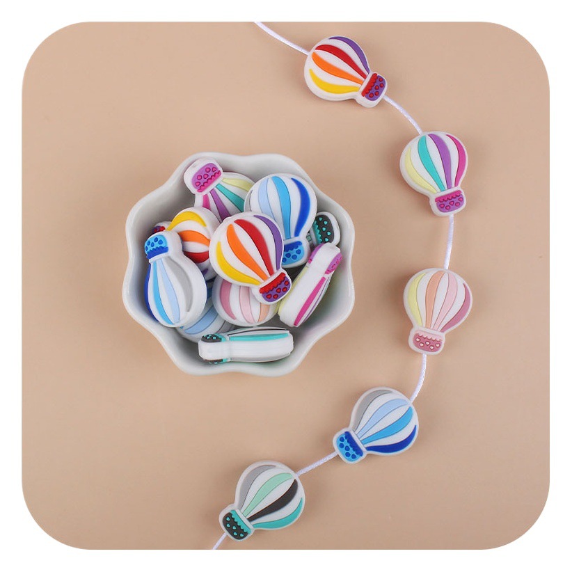Creativo DIY bebé suministros de dibujos animados de silicona color globo de aire caliente juguete mordedor bebé molar chupete cadena Accesorios