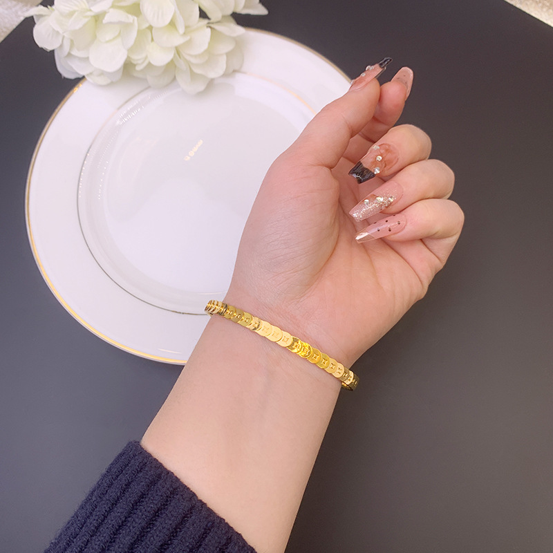 Nueva pulsera de oro de arena vietnamita, pulsera de moneda de cobre laminada retro, simple y versátil femenina, joyería al por mayor que no se desvanece durante mucho tiempo