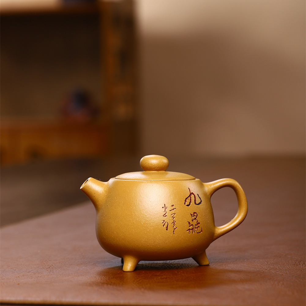 Yixing handmade purple clay pot wholesale live supply gift pot household raw ore section mud three-legged nine tripod pot