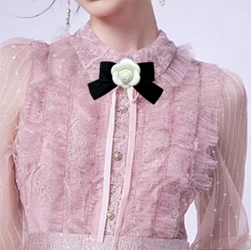 Vintage brocade ribbon butterfly knot camellia brooch with a touch of elegance, suitable for various occasions.