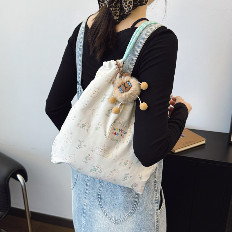 2025 bolsas casuales de alto valor, bolsas de mano, bolsas de regalo prácticas, cajas de regalos, bolsas de brazo de hombro de nicho de alto nivel, moda