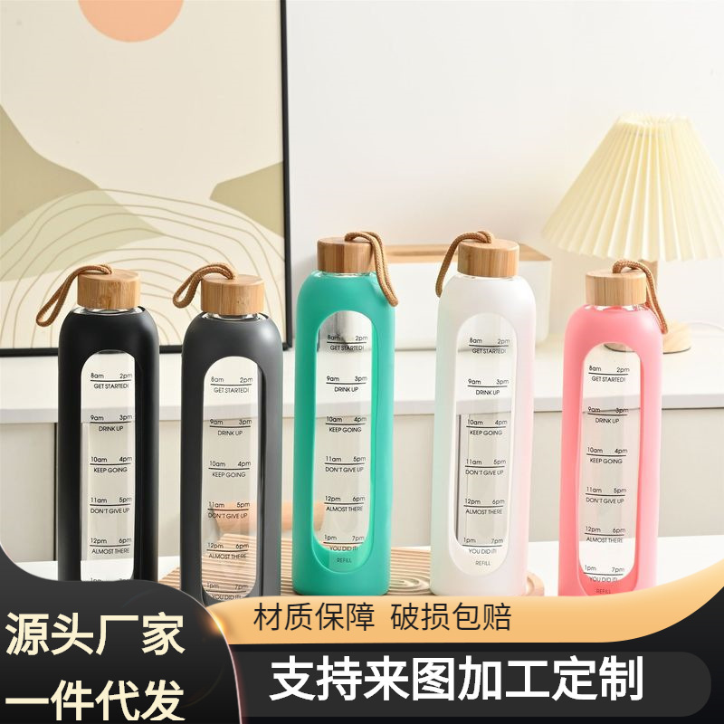 Taza de vidrio con tapa de bambú de gran capacidad transfronteriza, cuerda de elevación, cubierta de silicona portátil, taza de agua graduada, botella de agua deportiva de vidrio de alto valor