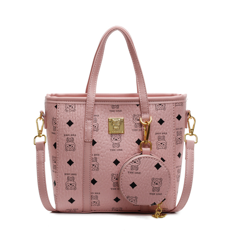 Bolsa de cubo portátil de impresión de moda super caliente para mujeres 2025, nuevo bolso de hombro de nicho universal, bolso de cinturón en línea.