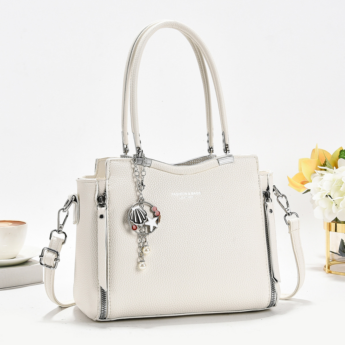 Bolso de madre de mediana edad de gran capacidad para mujer 2025 nuevo bolso atmosférico bolso de mensajero simple bolso de alta gama para mujer