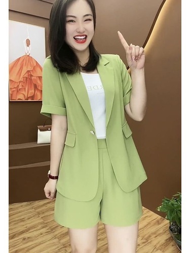 Plus-size women's casual shorts and suit set for summer—timeless, trendy, and stylish two-piece outfit designed to flatter curves.