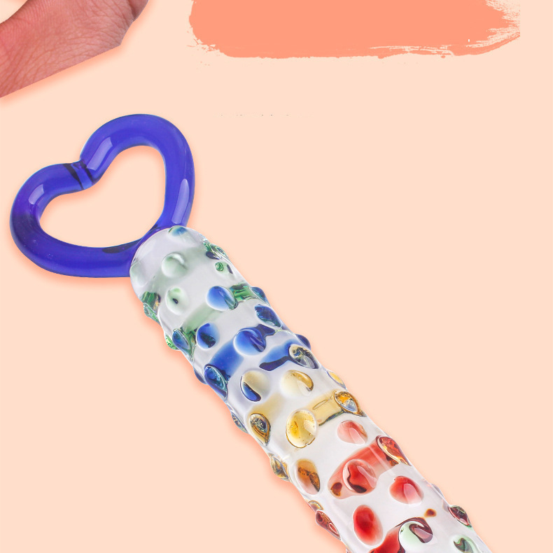 Glass Anal Plug with Heart-Shaped Pull-Tab, Raised Points and Textured Shaft, Transparent Pink — detail image 6