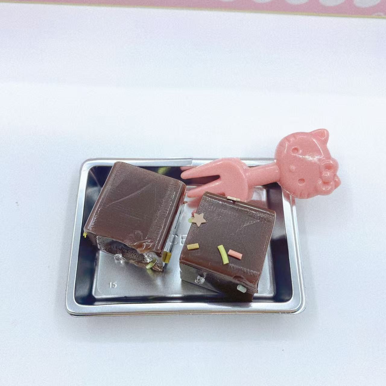 Simulación de chocolate pellizco pellizco juguetes de compresión DIY juguetes infantiles pellizco diversión 2 yuanes grandes almacenes al por mayor