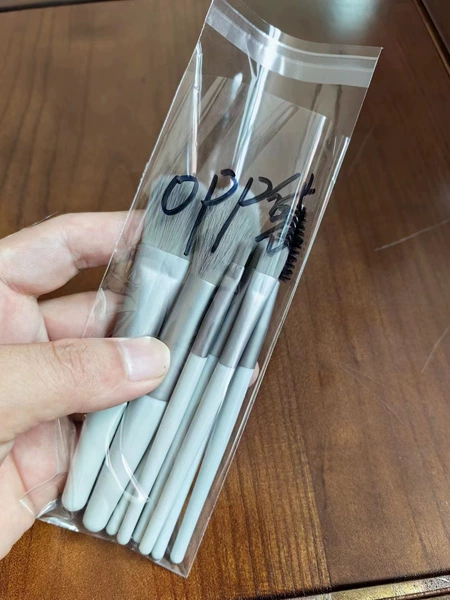 Small version of green OPP bag