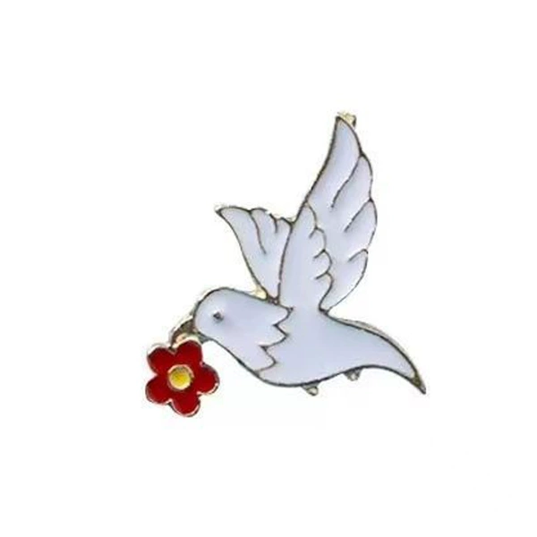 White pigeon holding red flower in mouth