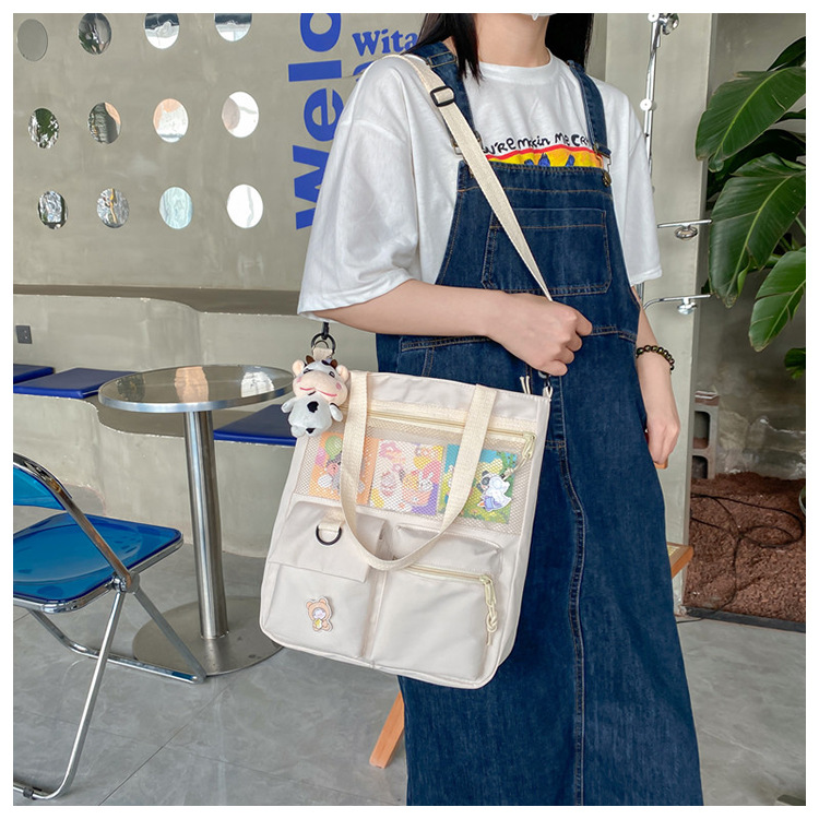 Large-capacity Japanese-style single-shoulder canvas bag for girls, versatile crossbody, ins, a tote bag for junior high school students' classes, and a schoolbag for after-school tutoring undefined