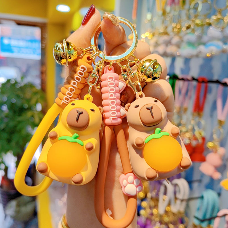 Caricatura Capibara Dolphin Doll Colgante pareja lindo llavero de automóvil bolso de pareja colgante pequeño regalo