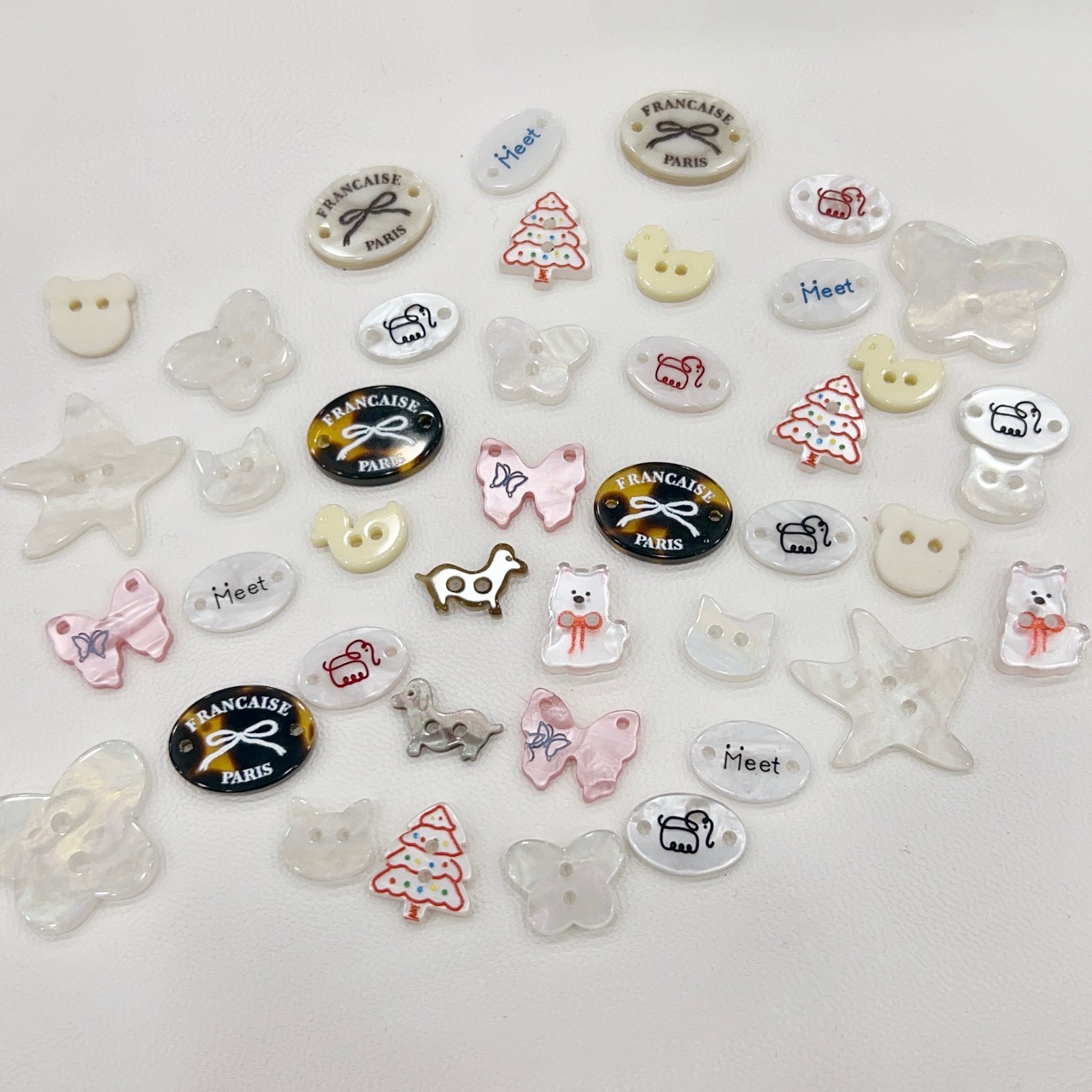 2025秋冬新款树脂纽扣衣标针织衫帽子毛衣袜子标牌配件辅料