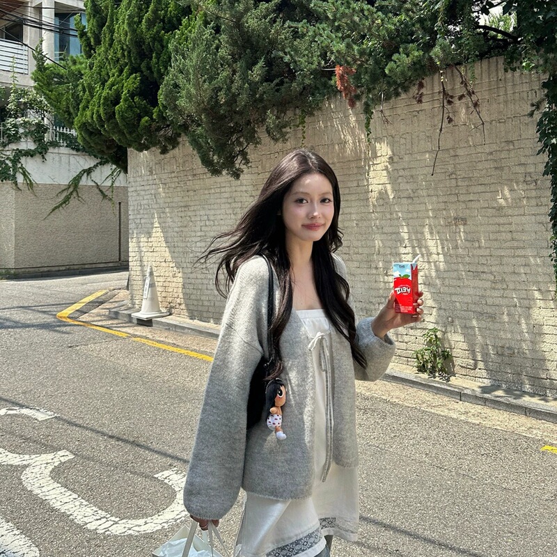 Siiooye soft textured knit cardigan with a relaxed fit, perfect for autumn