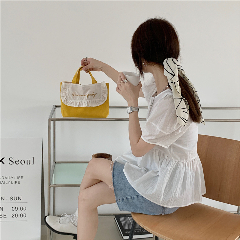 1441 Japanese and Korean chic Sweet ruffled bento Bag, Fresh embroidered hand-held small cloth bag, girl student bag wholesale undefined