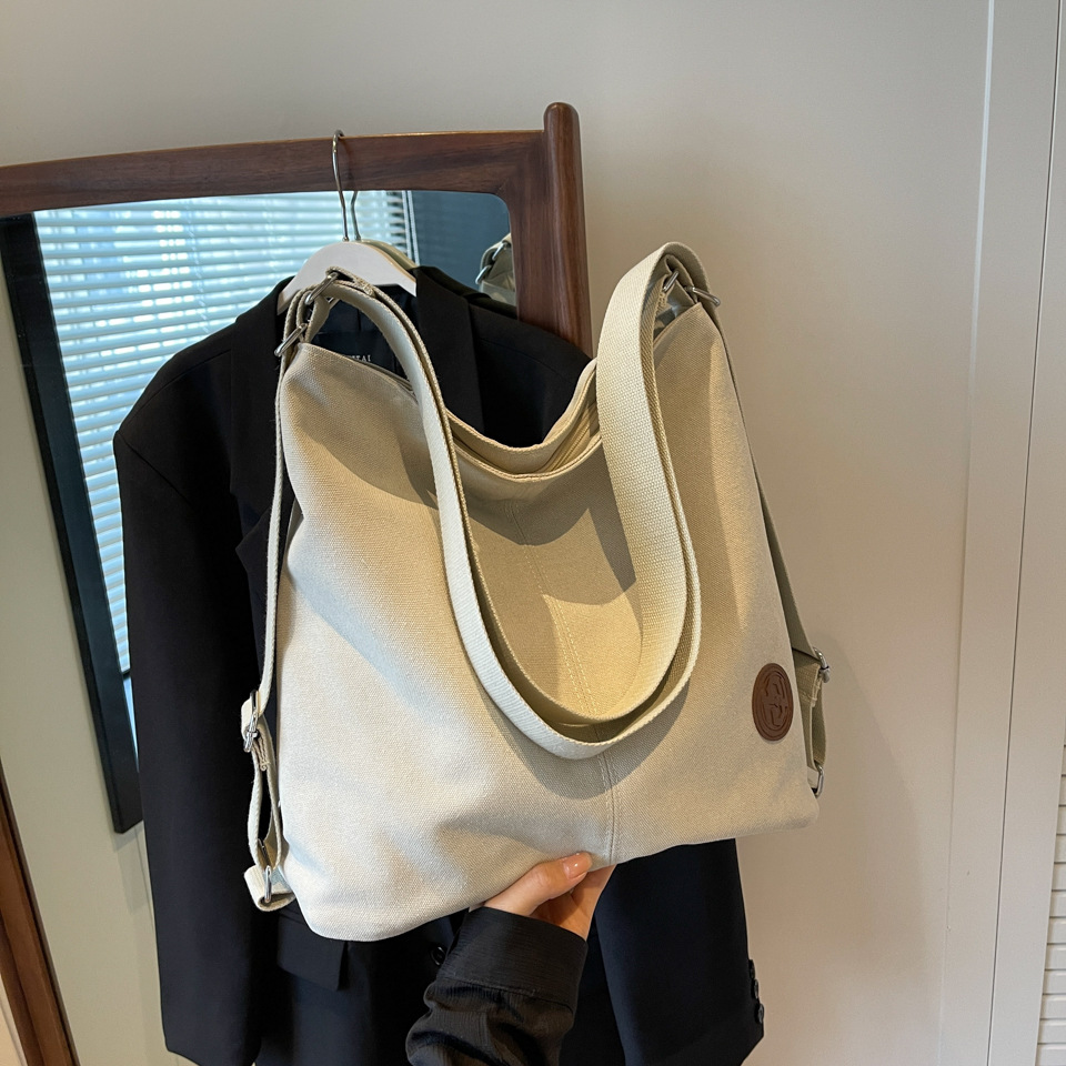 通勤包大容量女式简约双肩包2025新款秋冬季流行后背包单肩斜挎包