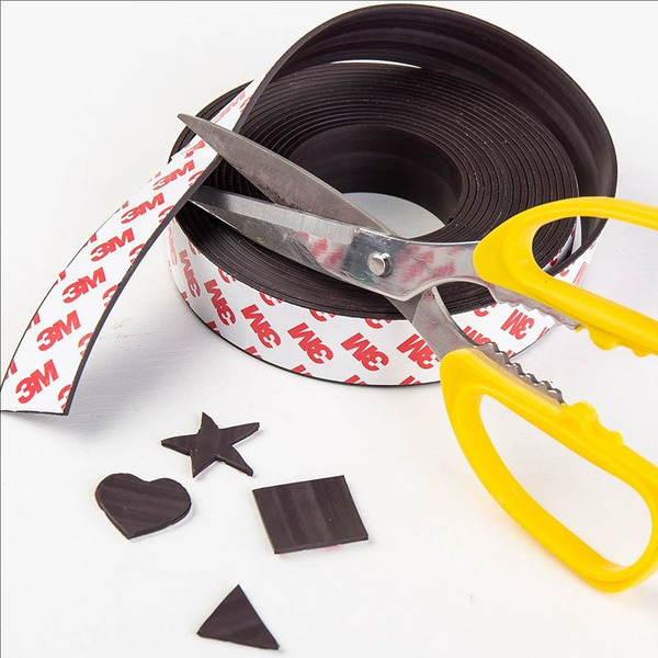 Adhesive fridge magnet