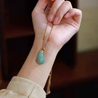 Фабрика Hetian Jade Store Ювелирные изделия из нефрита Натуральный нефрит Синьцзян Хэтиан Нефрит Яшма Старый материал Порошковый зеленый нефрит Подвеска с орхидеей