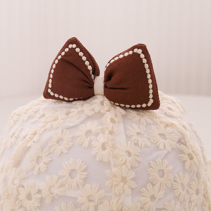 Sombreros para bebés otoño y invierno nuevos bonitos gorros para bebés gorras de arco de flores, gorras de pescador de chicas universales
