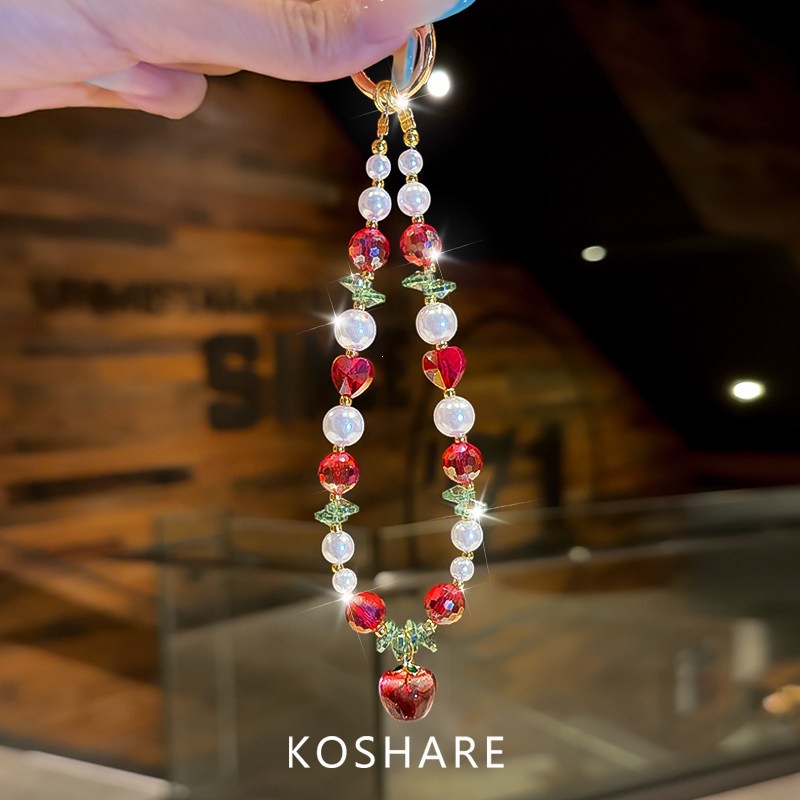 Manzana roja de verano fresca cadena de teléfono móvil ligera de lujo nicho de alto nivel bolso de cristal colgante colgante colgante de mano colgante mujer