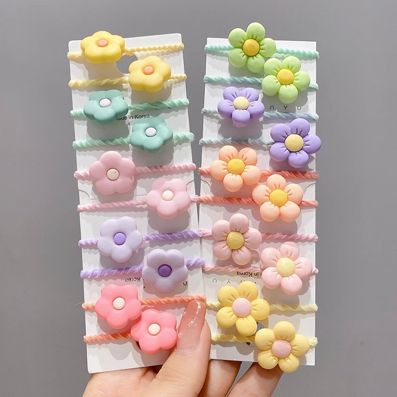 La cuerda del pelo del bebé de las muchachas de la banda de goma de los niños no lastima el pelo Los accesorios del pelo del pulgar del tamaño pequeño atan la banda de goma del pelo