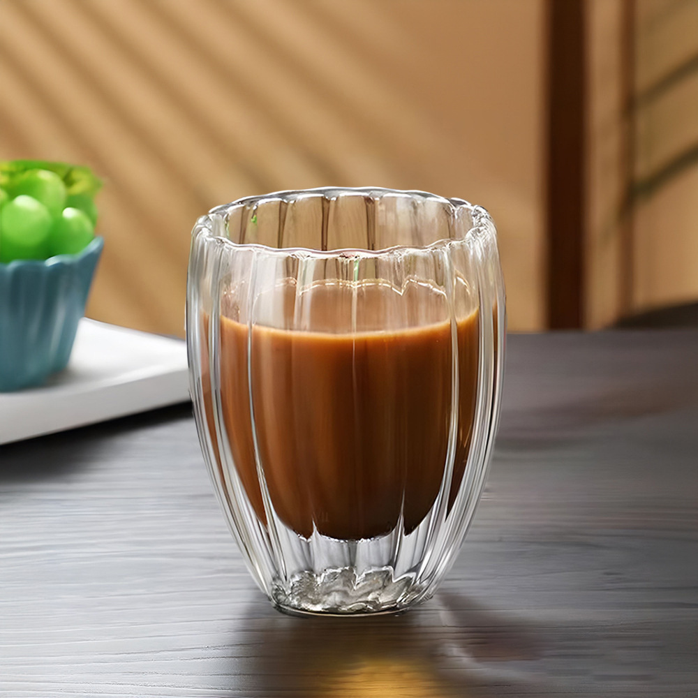 Taza de vidrio de alta borosilicona transparente con mango creativo de alta temperatura resistente a la taza de café