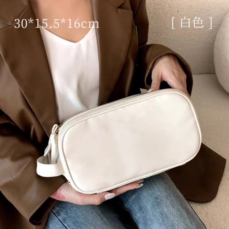 Bolsa de cosméticos súper popular para mujeres de gran capacidad portátil de viaje 2023 nuevo cepillo de maquillaje de alta calidad bolsa de almacenamiento de artículos de tocador