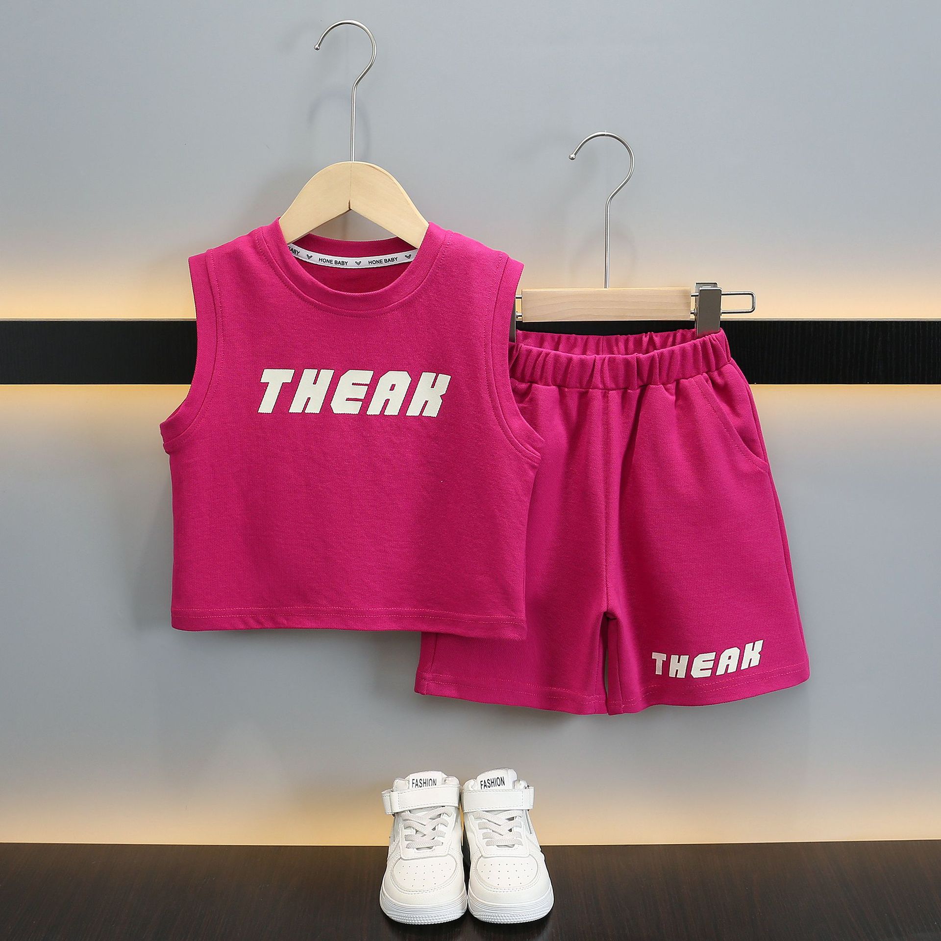 7363 traje de niño verano 2025 nuevos pantalones cortos de chaleco sin mangas delgados para niños estilo de verano deporte de dos piezas verano