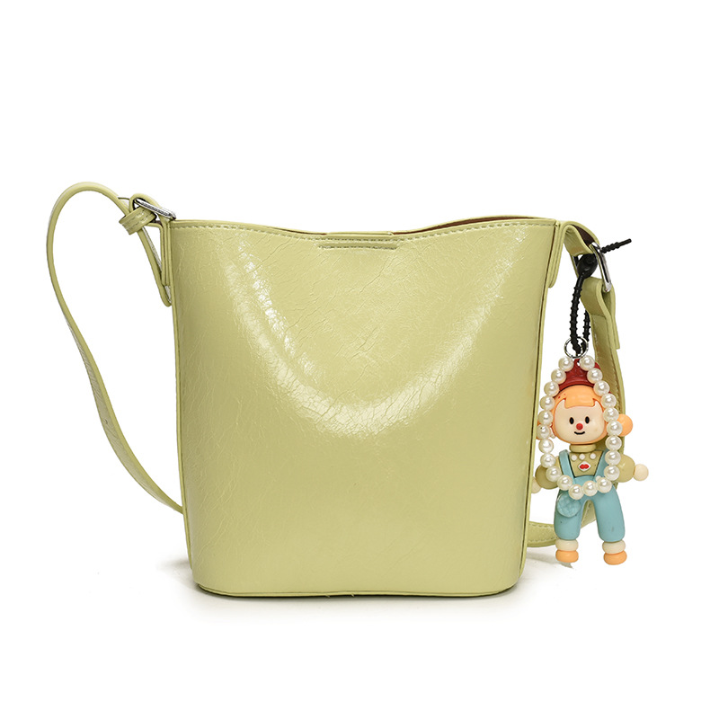 Bolso de cubo de tendencia simple y de alto nivel para mujer 2025 nuevo bolso de hombro casual de moda bolso de mensajero de cercanías