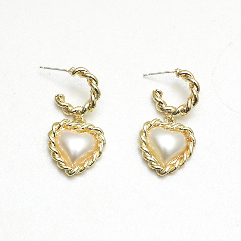 Fashion Twist Heart-shape Pearl Alloy Earrings Wholesale display picture 4