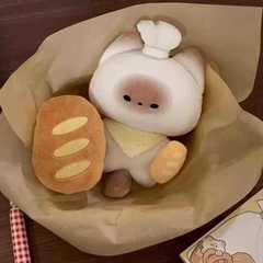 小紅の本の同じ種類のフランスのトーストの猫の人形のぬいぐるみはぬいぐるみのコックのシャムの猫の鍵を掛けて学生を掛けます。