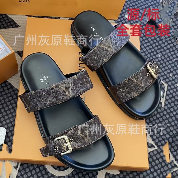 Comercio exterior 24 nuevo estilo Oriente Medio Camboya pantuflas de playa hombres y mujeres ropa exterior fondo plano hebilla de metal letras zapatillas de burro fuente pura