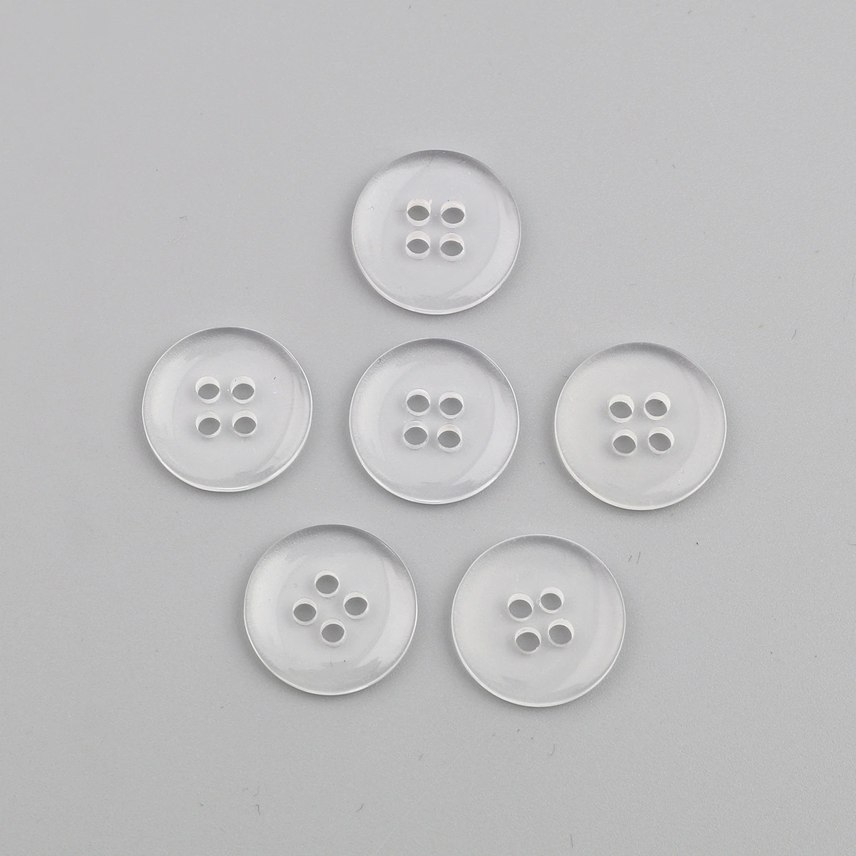 Фабрика прямых продаж прозрачные круглые четыре отверстия смолы кнопки около 15 ммм-300 аксессуары ручной перфорированный оптом