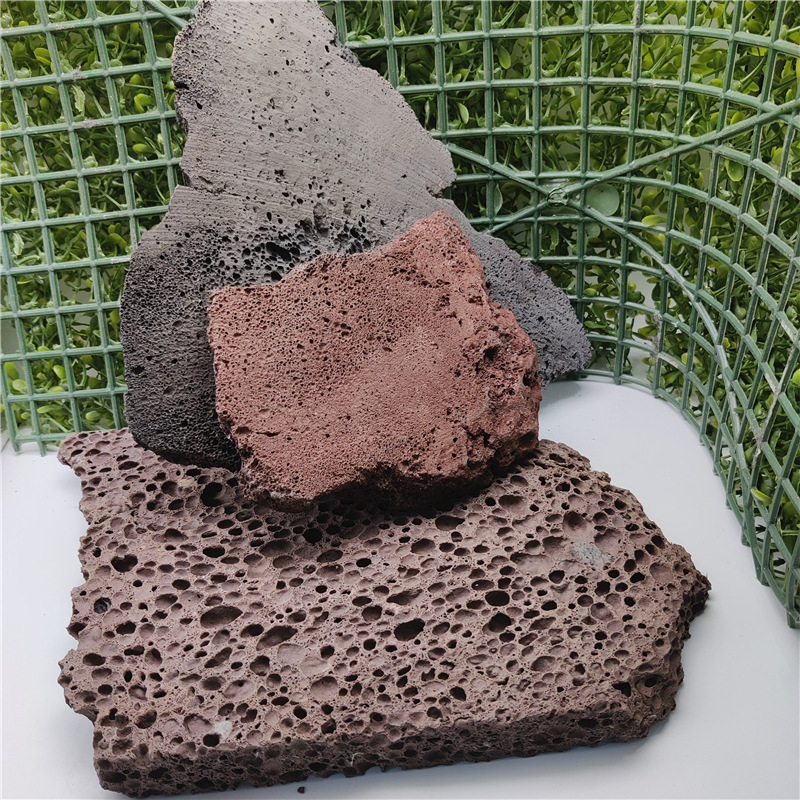 火山石の破片と赤と黒の破片と火山岩の地面と壁の装飾用の火山石の板|undefined