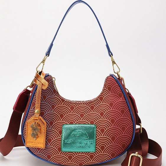 2025 bolso de mujer, personalidad de nicho de alta gama, bolso de axila de color degradado, bolso de axila de hombro, venta caliente transfronteriza, bolso de luna nueva