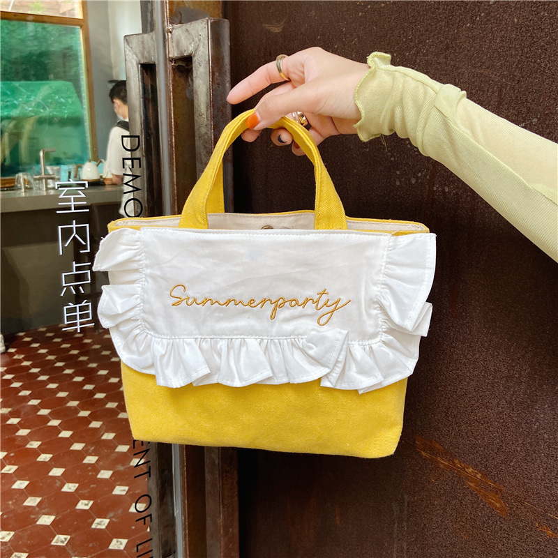 1441 Japanese and Korean chic Sweet ruffled bento Bag, Fresh embroidered hand-held small cloth bag, girl student bag wholesale undefined