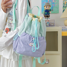 新款大容量双肩包男女同款休闲手机包轻便小背包抽绳登山水桶包