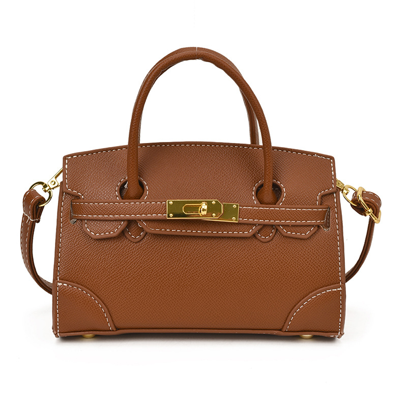 Coreano simple color sólido bolso de hombro para niños y niñas pequeño mini bolso de mano bebé nuevo bolso de comercio exterior transfronterizo para niños