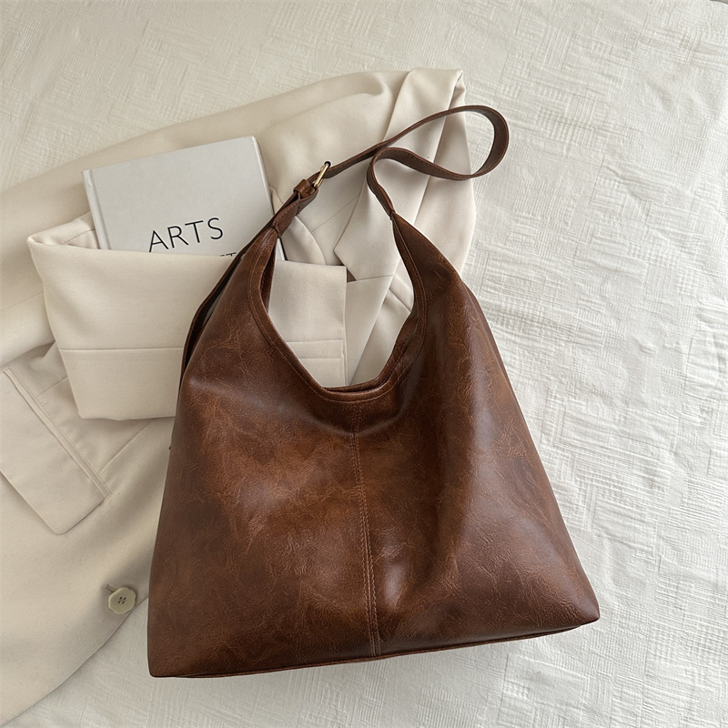 2025 primavera nueva moda bolsos de mano de hombro de gran capacidad bolsos tote bolsos de mujer bolsos de viaje bolsos versátiles para mujeres