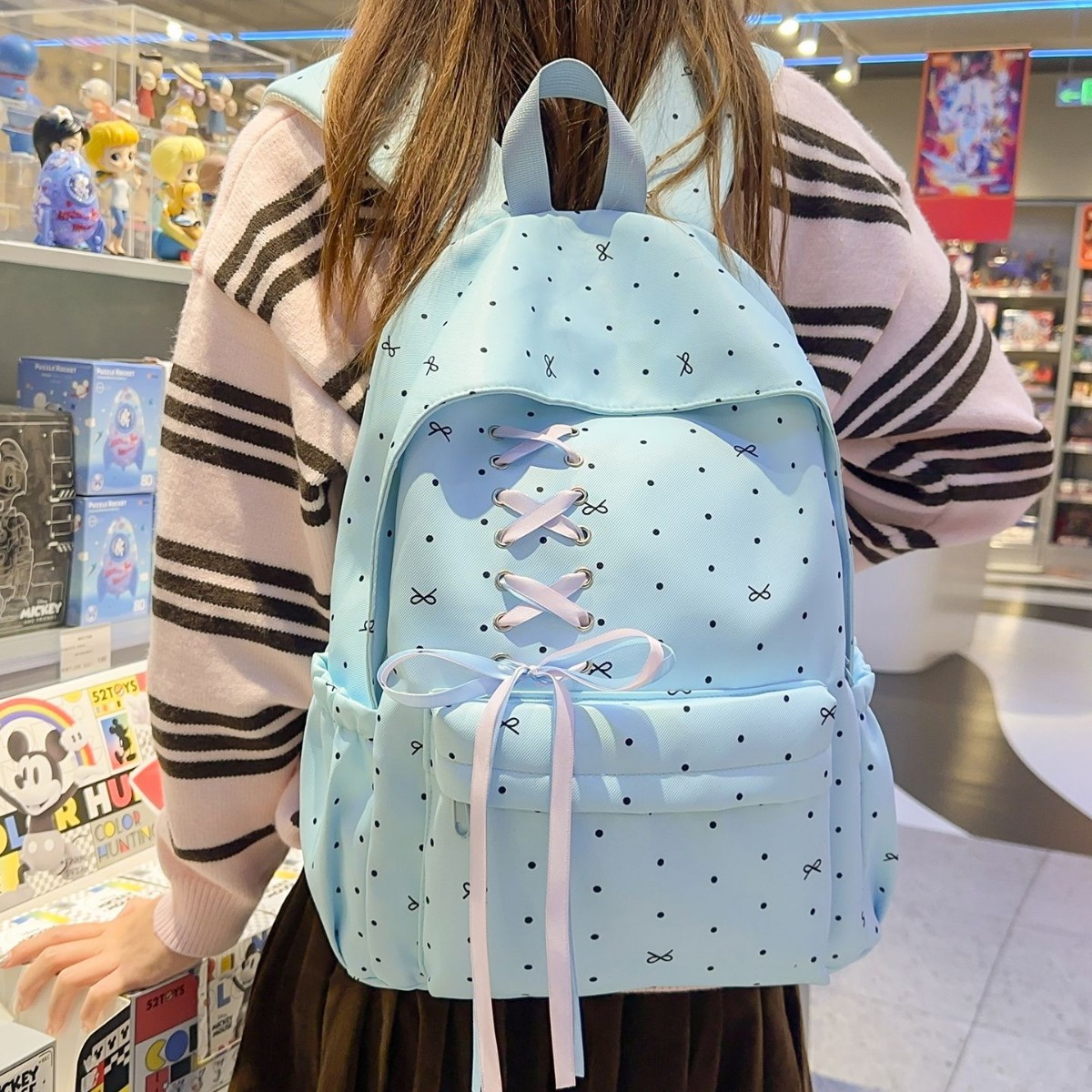 高颜值波点少女初高中生书包蝴蝶结大容量ins小众校园轻便双肩包