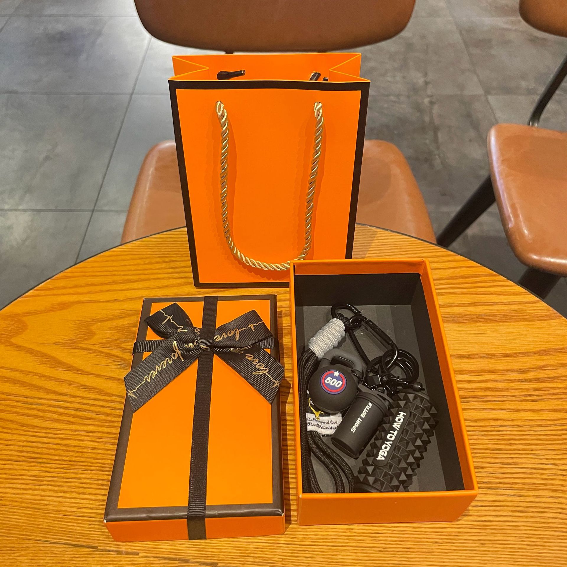 Black set for yoga from foam, orange gift box