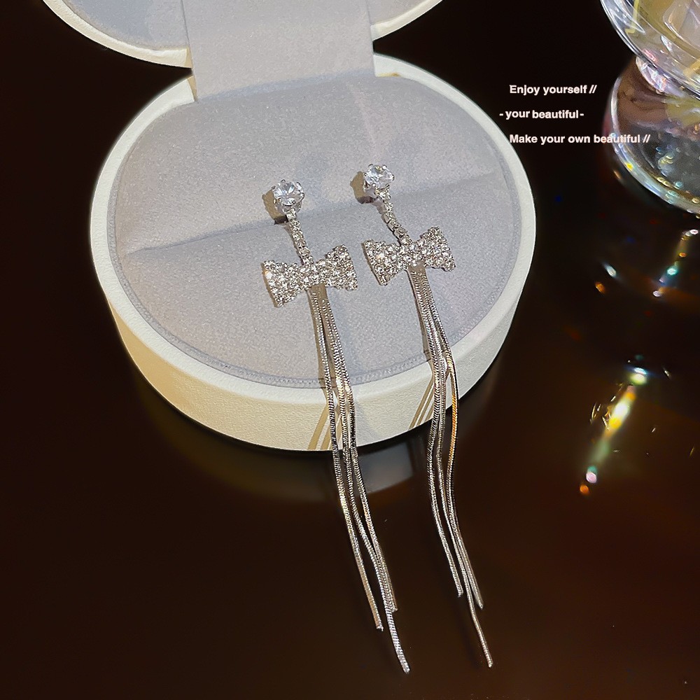 S925 aguja de plata elegante borla pendientes de alta gama simple cara de adelgazamiento pendientes de todo fósforo estilo coreano nuevos pendientes de moda al por mayor