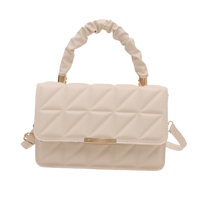 Minimalista bolso de viaje de viento 2024 engolpeado diamante otoño nuevo diseño de bolso de hombro simple estilo bolso de mochila