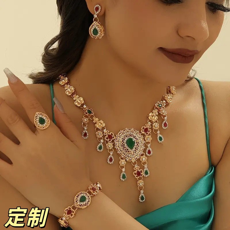 Vintage Middle Eastern four-piece set with hollowed-out water drop red and green gemstone necklace, earrings, bracelet, ring, dress accessories wholesale