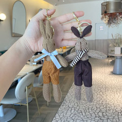 メーカー直販のファッションのバックパンツのウサギのバッグのペンダントの創意的な蝶ネクタイのウサギの子供の自動車のペンダントのキーホルダー